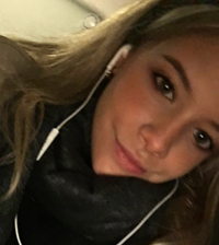 Elle K.